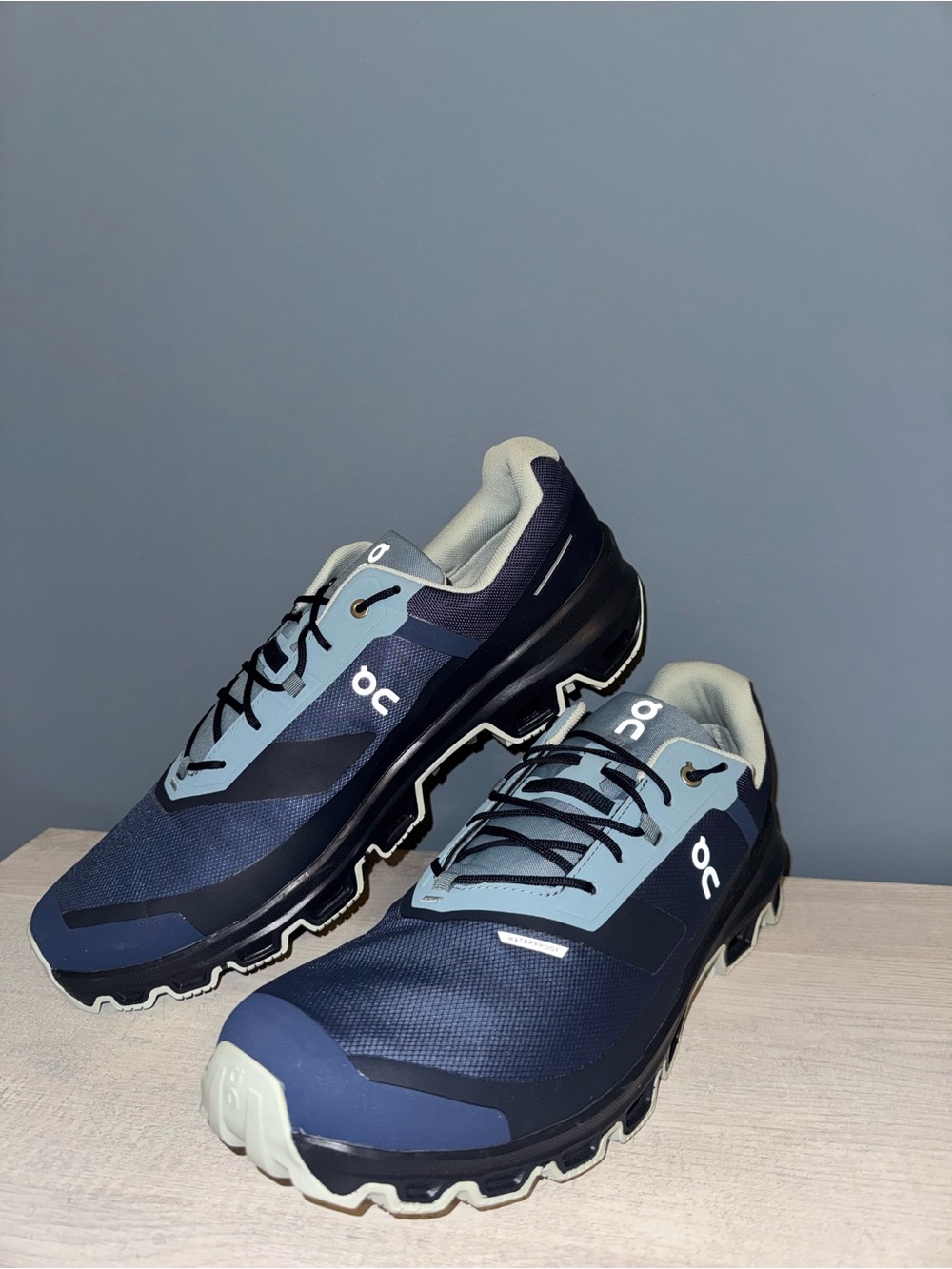 On Running Men's Trail Shoes in Navy and Light Gray